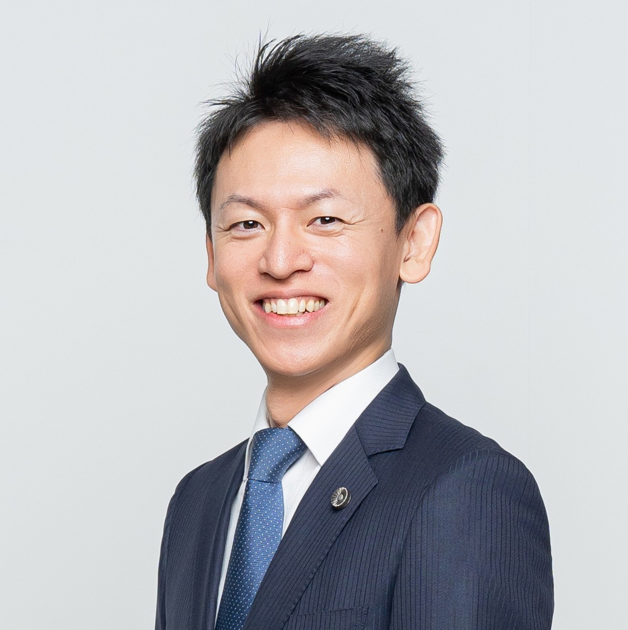 弁護士法人いろは 代表弁護士 古屋文和（ふるや ふみかず）の顔写真